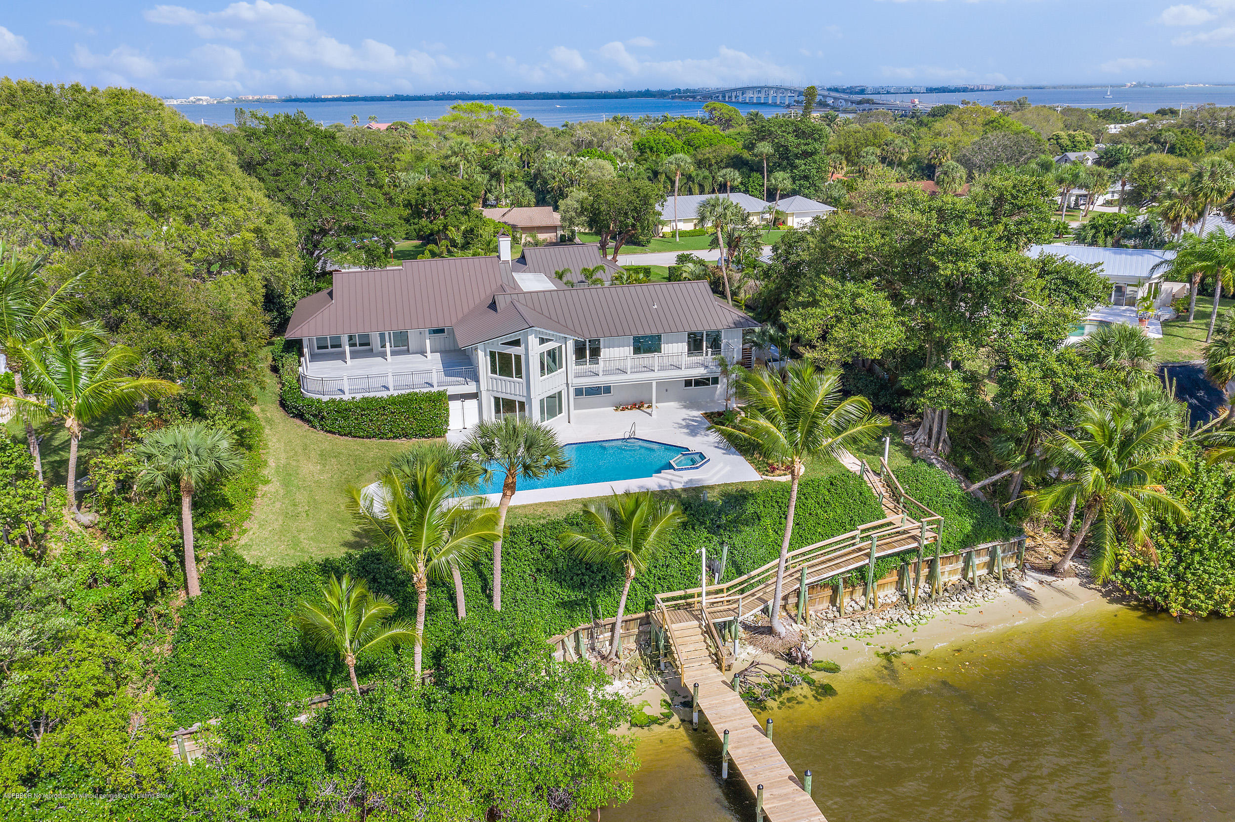 19 North River Road Sewall's Point, FL 34996 - Photo 48 of 51 an aerial view of a house with a garden and yard