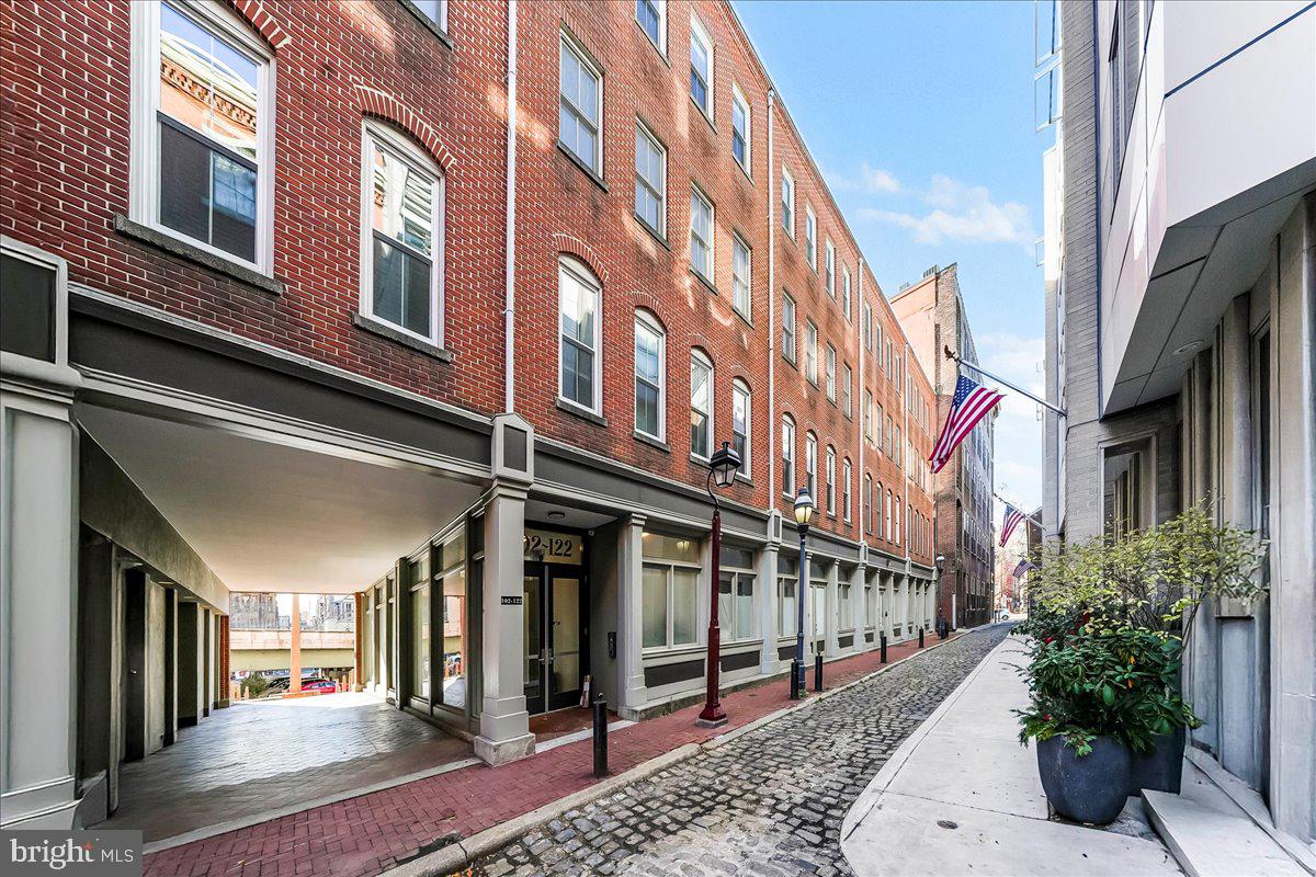 a view of a building with a street