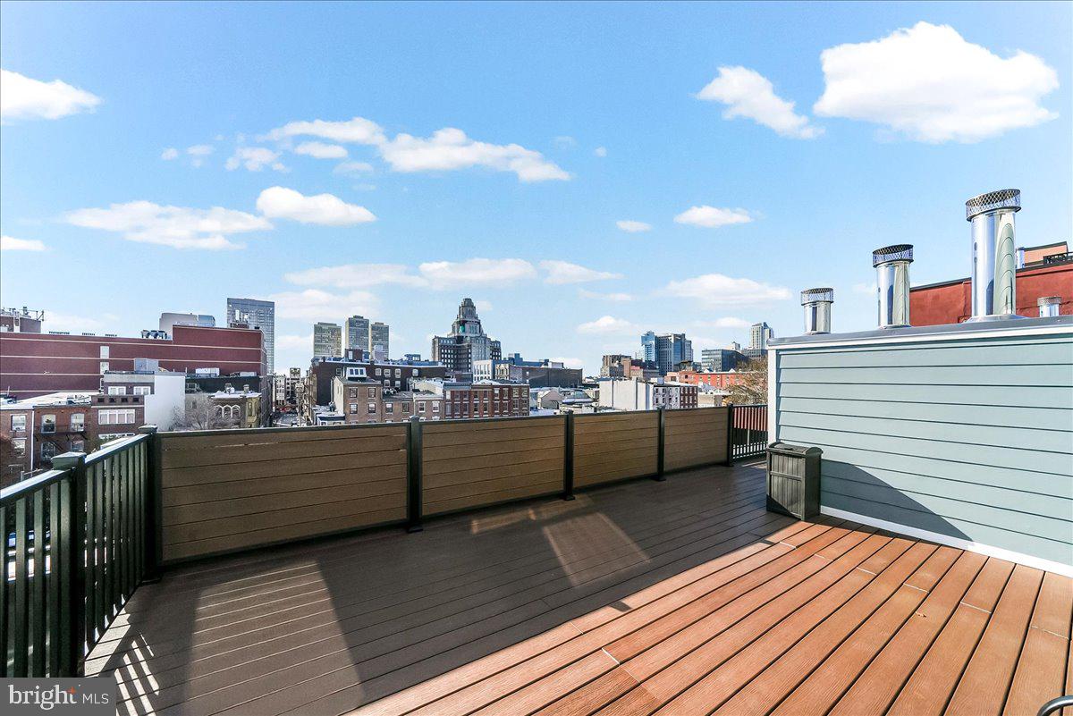 102 Church Street, Unit 402 Philadelphia, PA 19106 - Photo 15 of 24 a view of a terrace with a bench