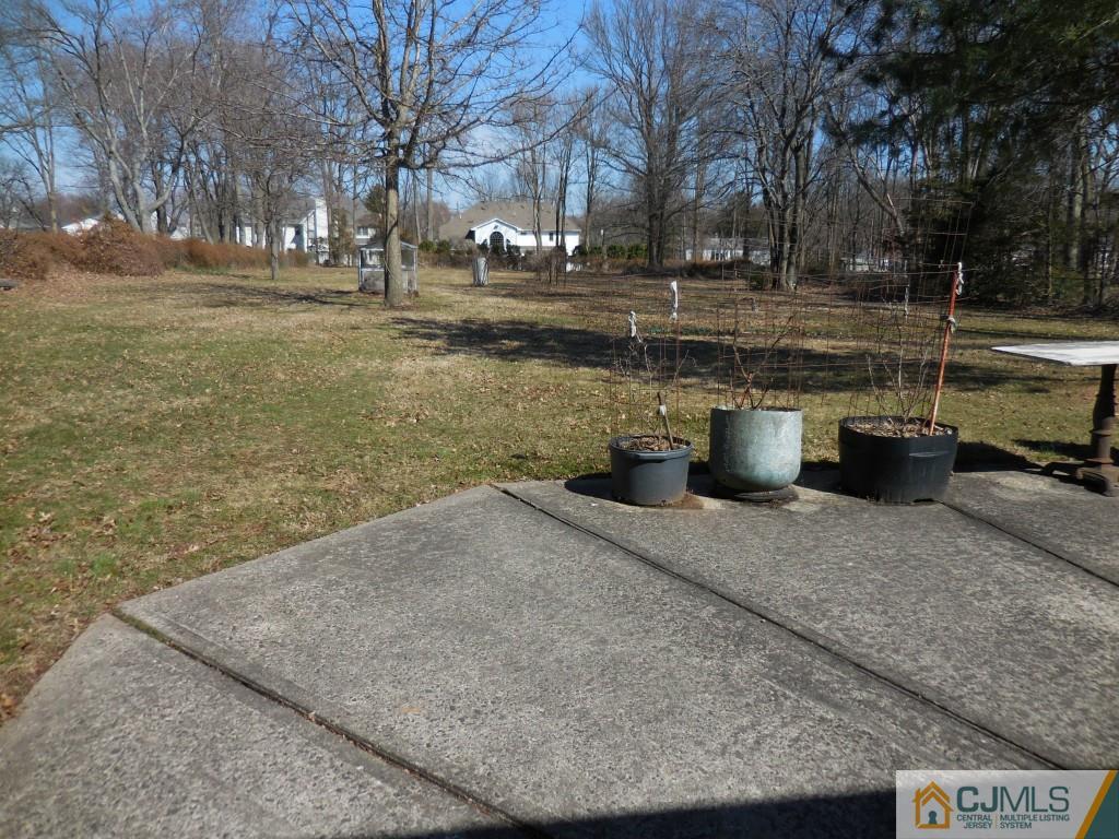 578 Darwin Boulevard Edison, NJ 08820 - Photo 19 of 20 a view of outdoor space yard and lake view