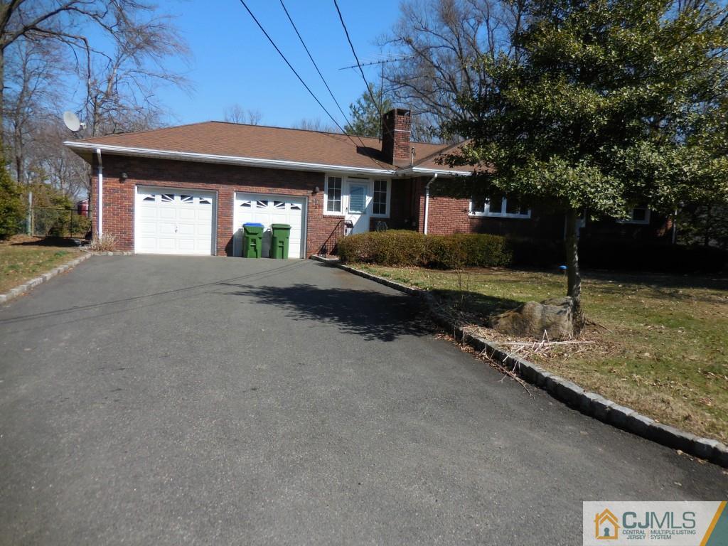 578 Darwin Boulevard Edison, NJ 08820 - Photo 3 of 20 a front view of a house with garden