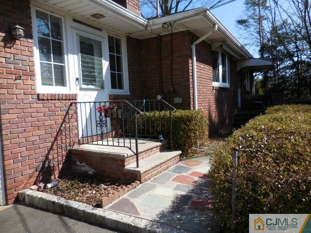 578 Darwin Boulevard Edison, NJ 08820 - Photo 4 of 20 a view of a house with a yard and pathway
