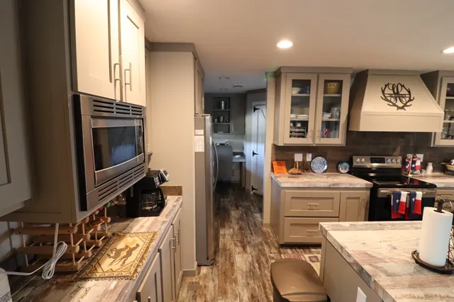 a view of a porch with wooden floor