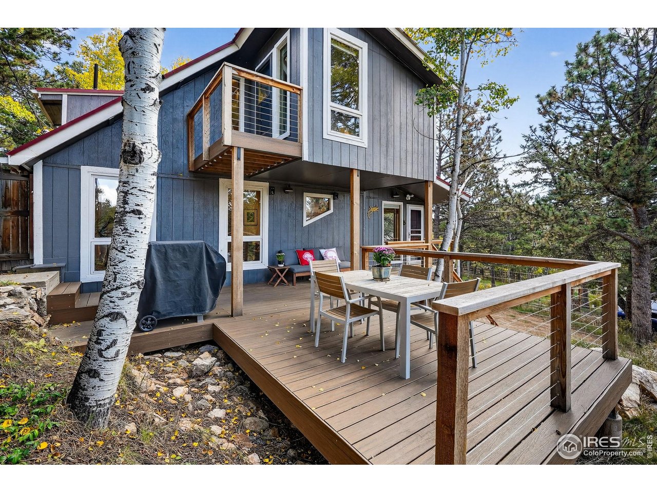 1707 Ridge Road Nederland, CO 80466 - Photo 4 of 50 Spacious and updated South-facing Trex Deck