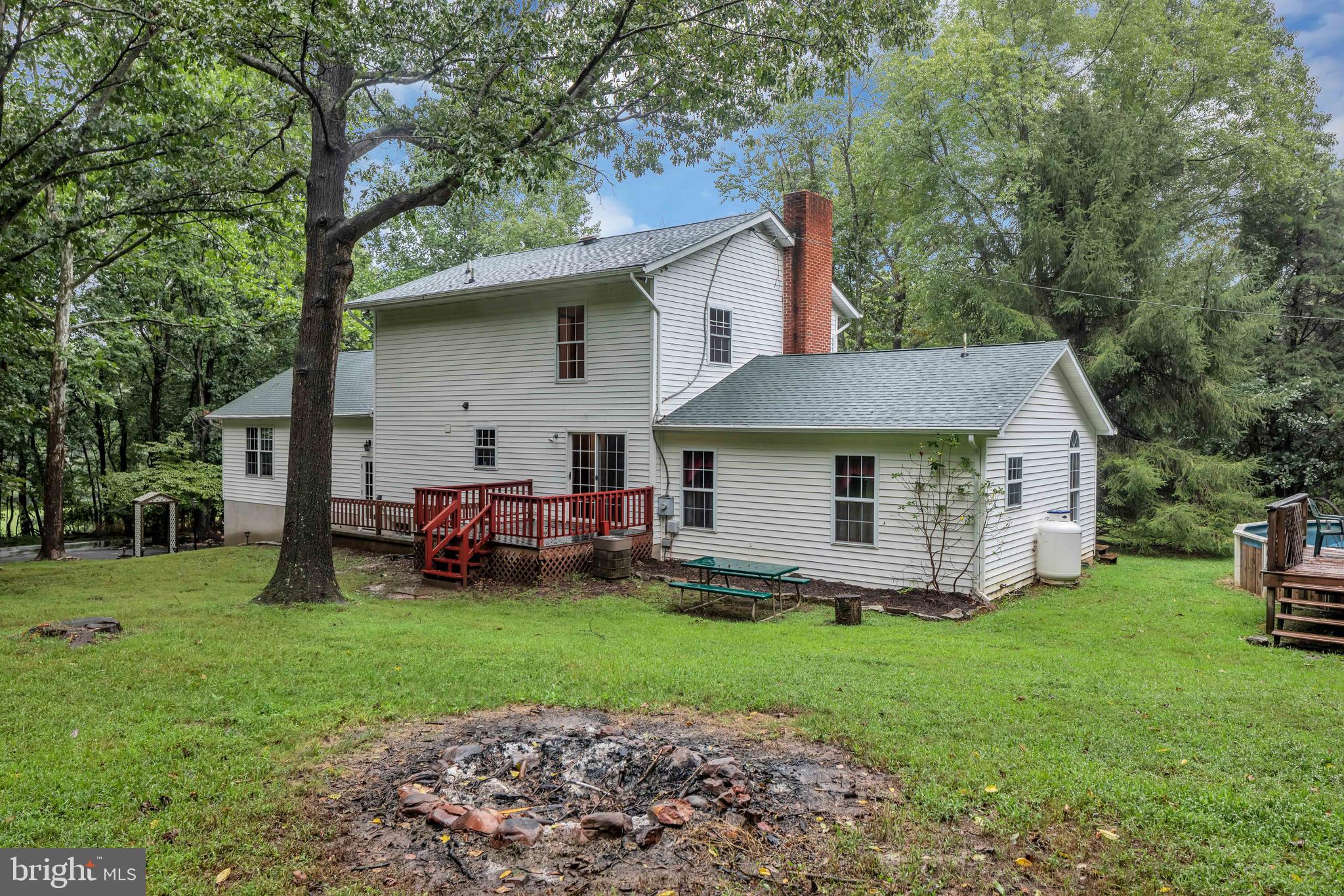 854 Stoney Bottom Road Front Royal, VA 22630 - Photo 35 of 38 Rear view with fire pit.