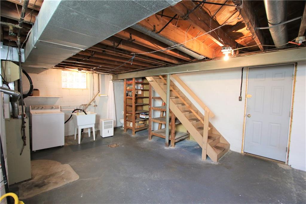 5319 Highgrove Road Whitehall, PA 15236 - Photo 17 of 24 HUGE 19x14 Open Basement area w/ Glass Block Windows & Pittsburgh Potty in corner