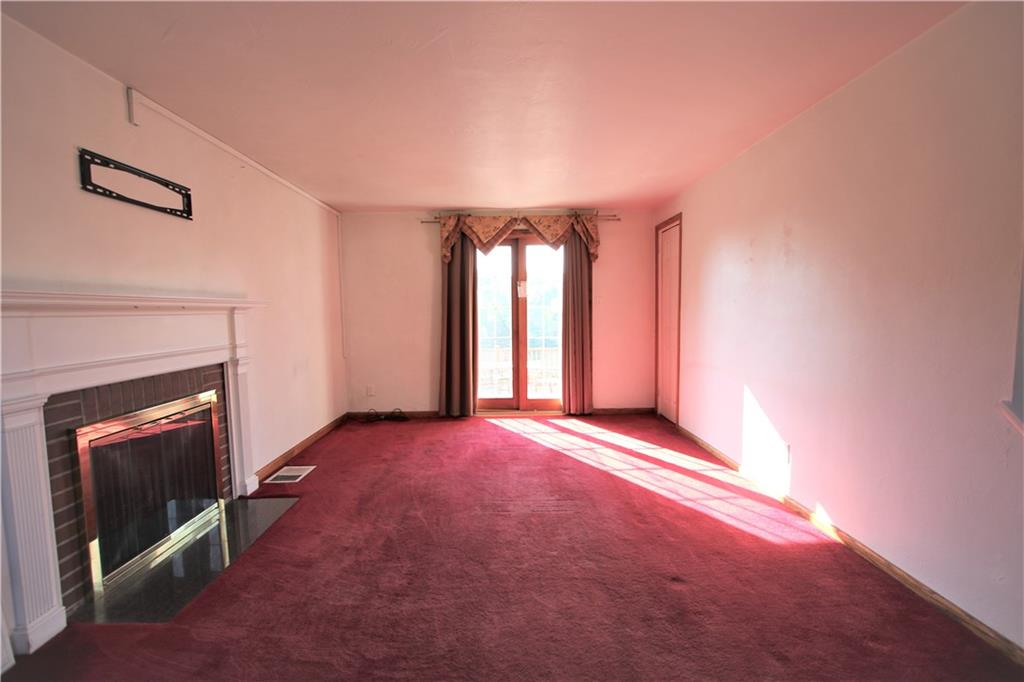 5319 Highgrove Road Whitehall, PA 15236 - Photo 5 of 24 Gorgeous Living Room w/ Coat Closet & Sliding Glass Door to Double Deck