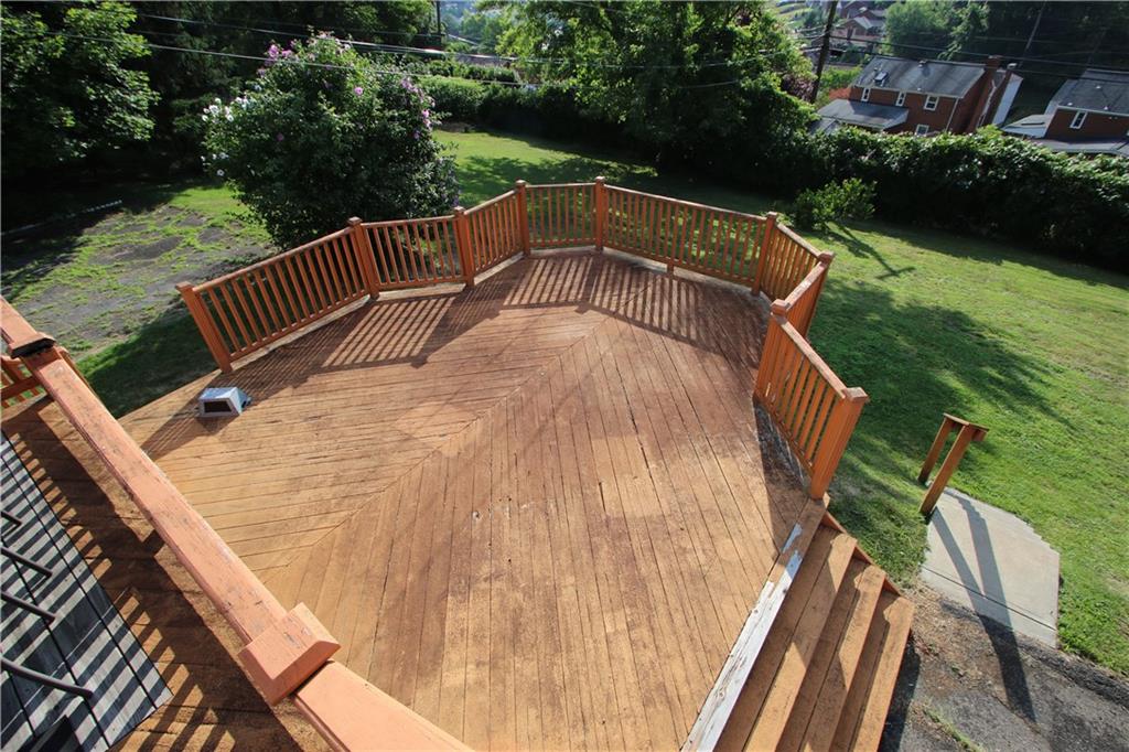 5319 Highgrove Road Whitehall, PA 15236 - Photo 7 of 24 MASSIVE Lower Level Deck overlooking Great Backyard(flooring being replaced and updated photo coming soon.....)