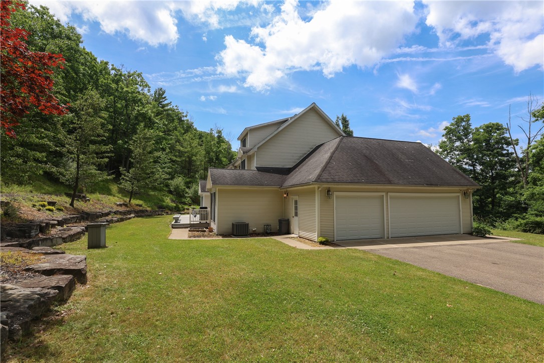3200 Goff Road Corning, NY 14830 - Photo 47 of 50 The three-car garage is on the north end of the ho