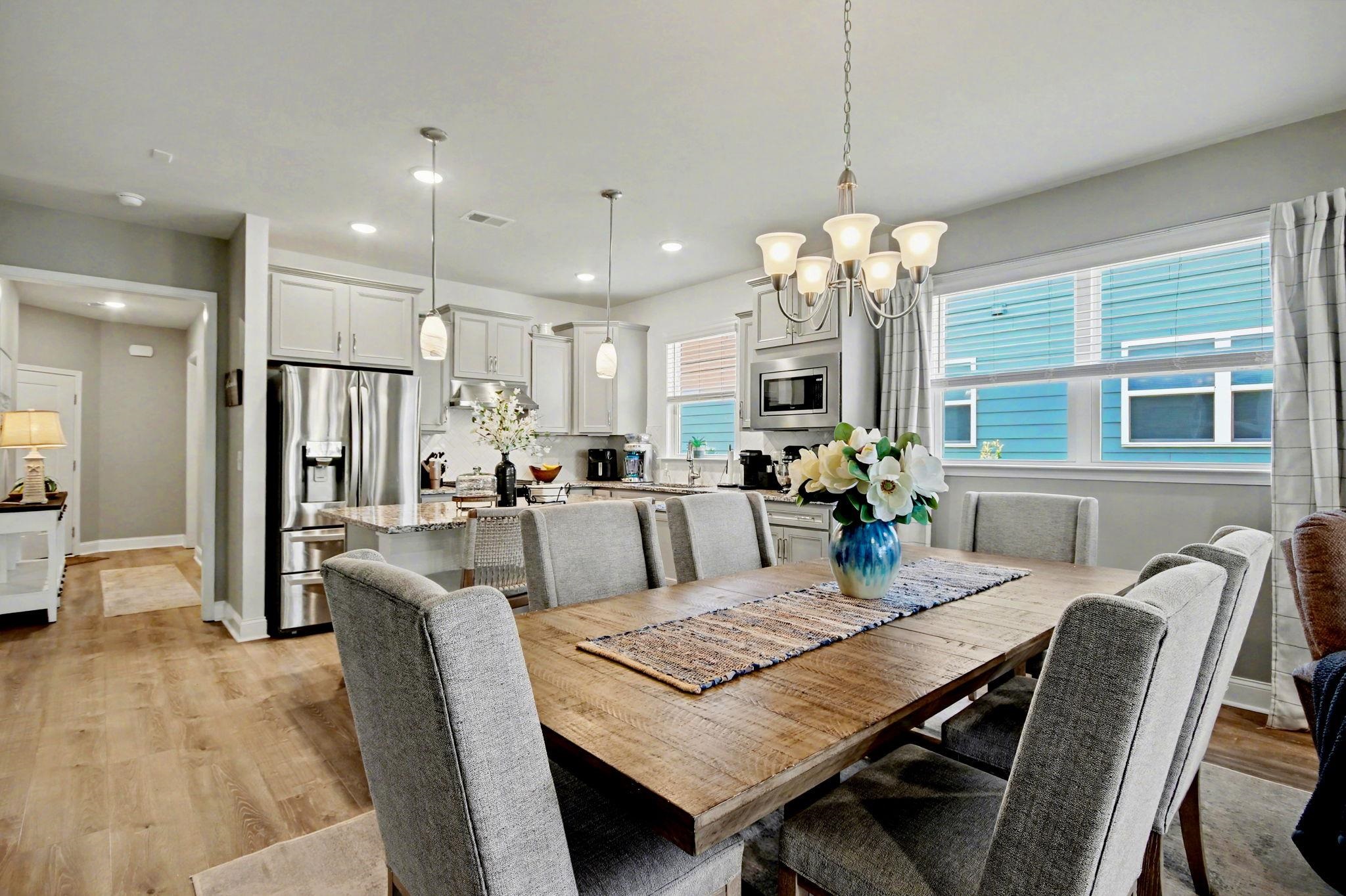5830 Cremona Drive Myrtle Beach, SC 29577 - Photo 15 of 39 Dining area featuring a chandelier, light wood-style flooring, and recessed lighting