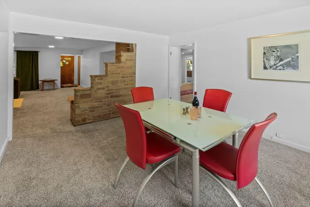 a view of a dining room with furniture