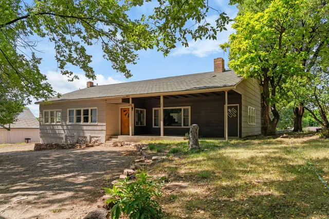 a house with yard in front of it