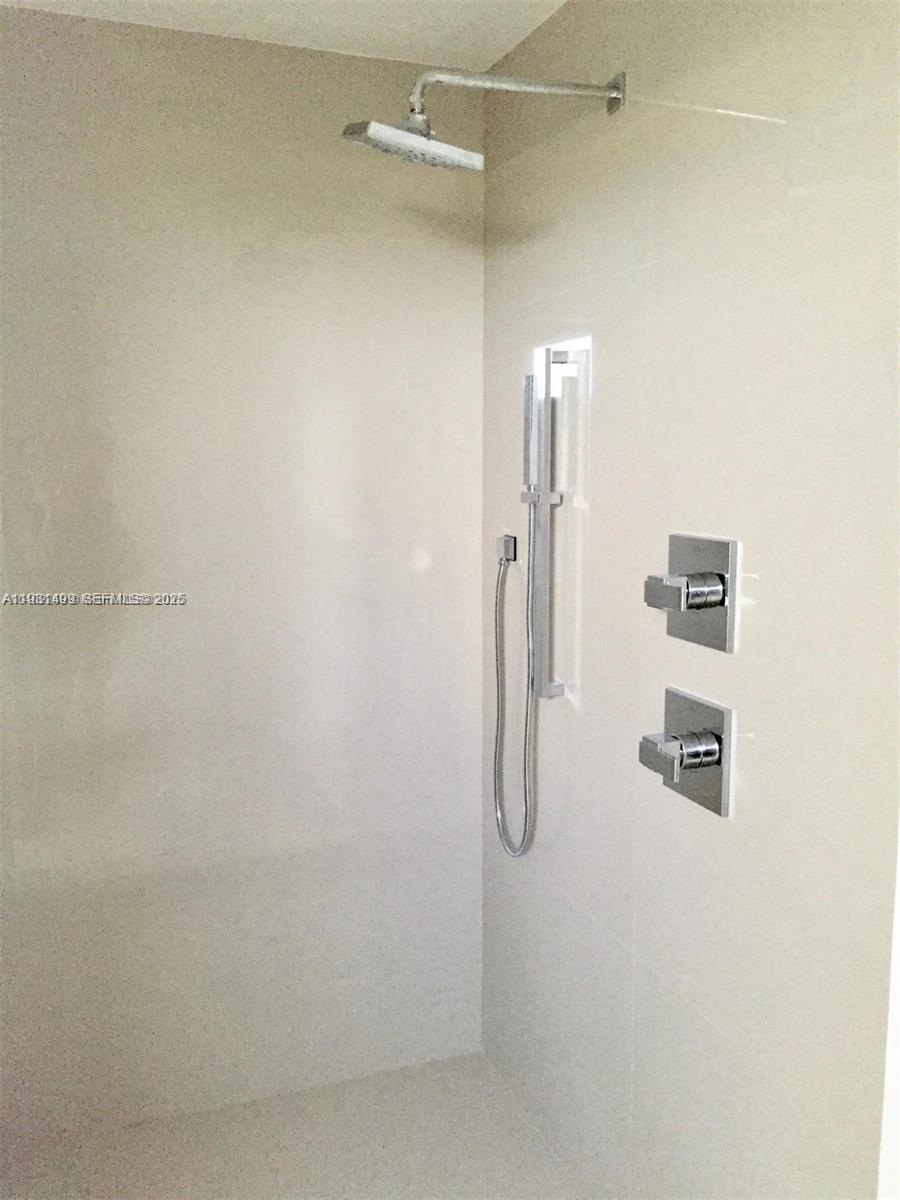 600 Northeast 27th Street, Unit 2001 Miami, FL 33137 - Photo 13 of 18 a bathroom with a shower