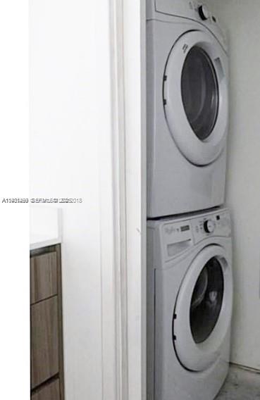 600 Northeast 27th Street, Unit 2001 Miami, FL 33137 - Photo 14 of 18 a utility room with dryer and washer