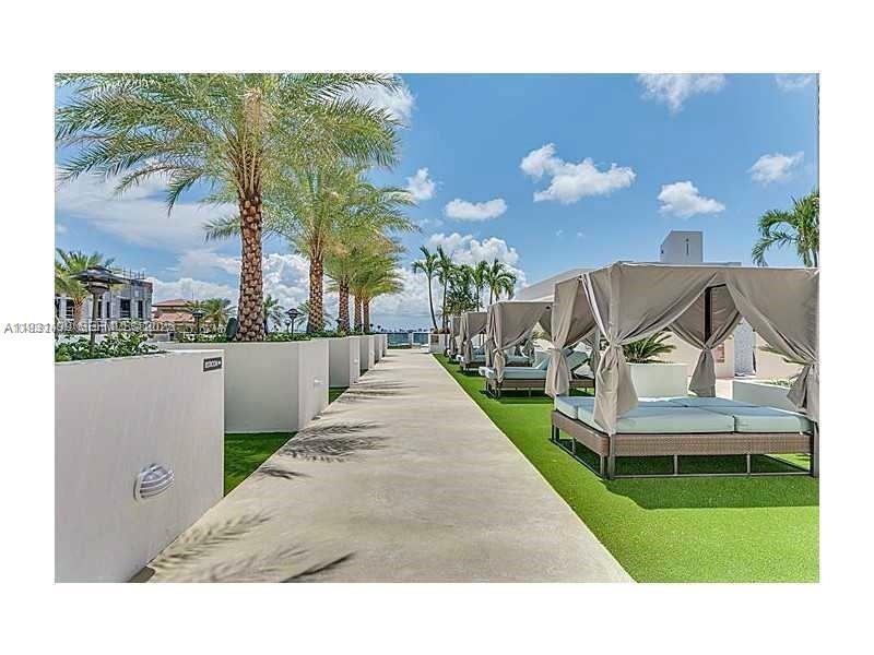 600 Northeast 27th Street, Unit 2001 Miami, FL 33137 - Photo 5 of 18 a view of a house with a yard