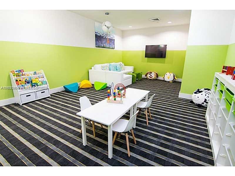 600 Northeast 27th Street, Unit 2001 Miami, FL 33137 - Photo 8 of 18 a view of a dining room with furniture