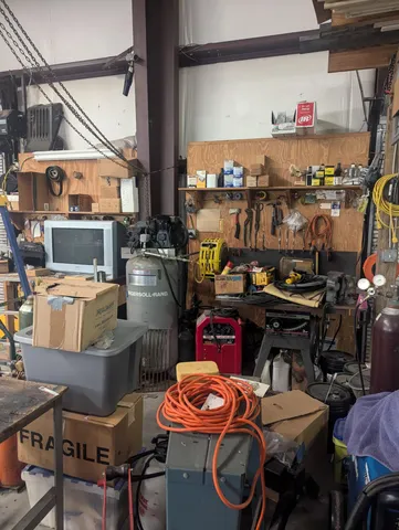 a view of parking garage with cars