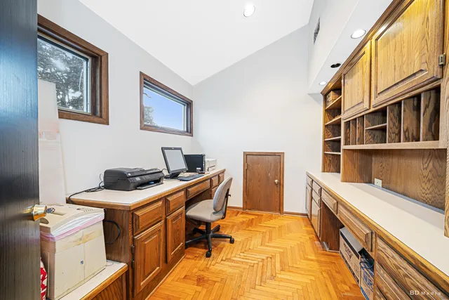 a view of a workspace with furniture