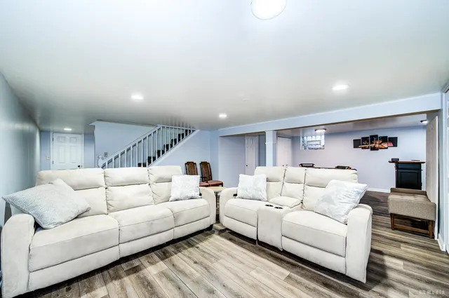 a living room with furniture and a couch