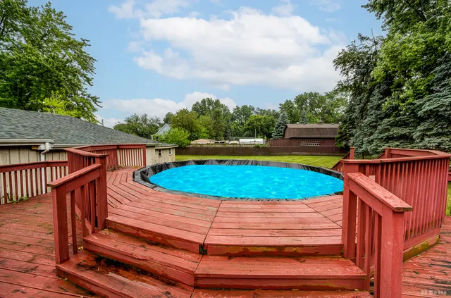 a view of garden with deck and garden