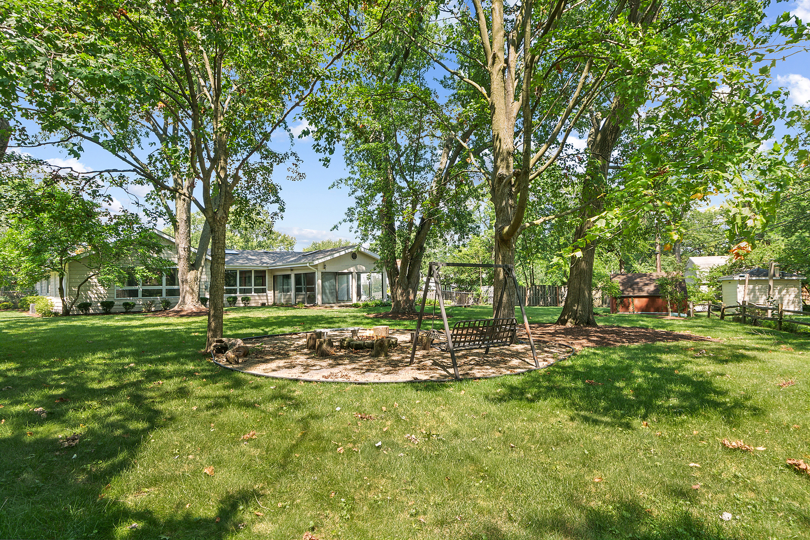 509 Hawthorne Road Frankfort, IL 60423 - Photo 4 of 36 a front view of a house with a garden