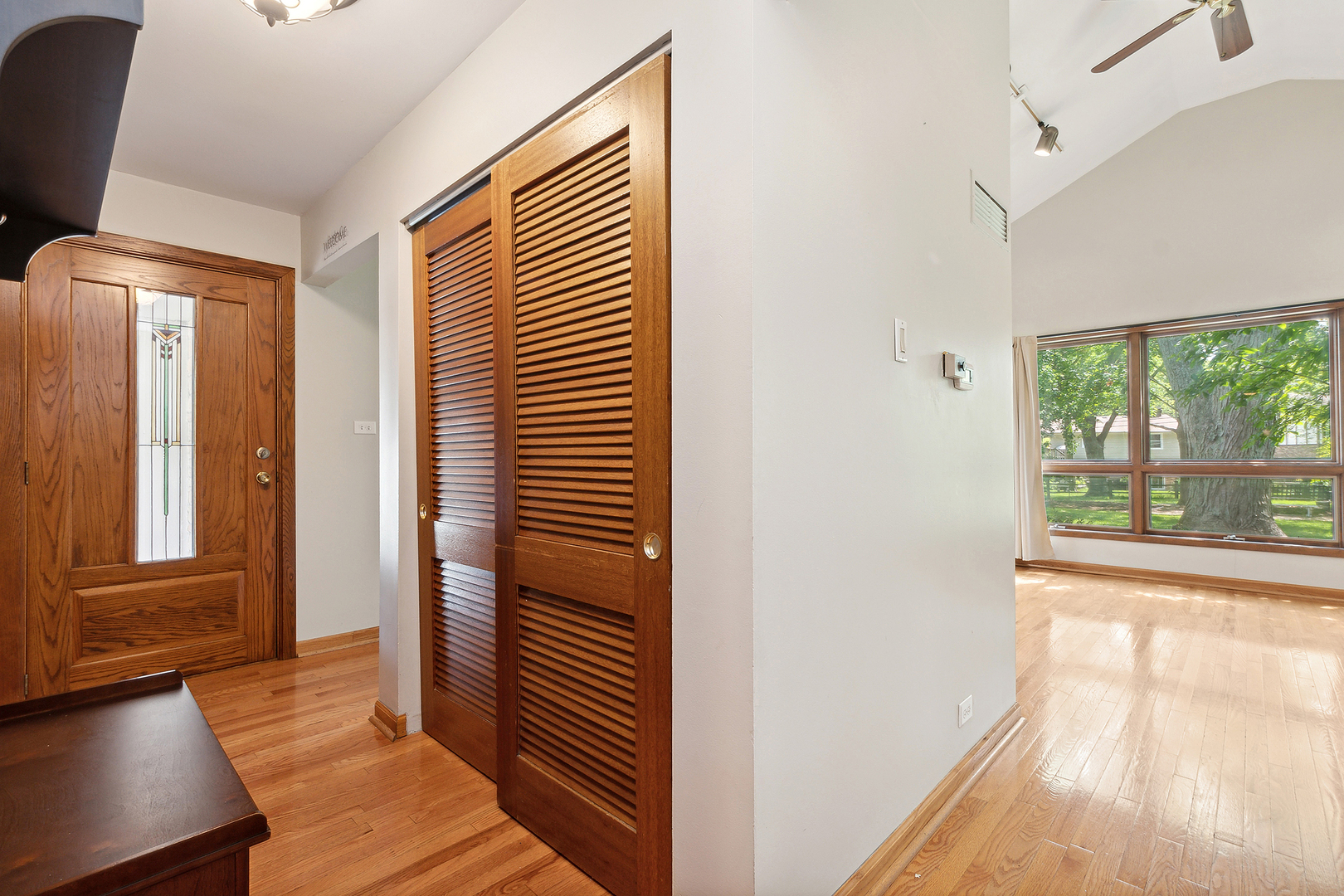 509 Hawthorne Road Frankfort, IL 60423 - Photo 8 of 36 a view of a room with wooden floor and windows