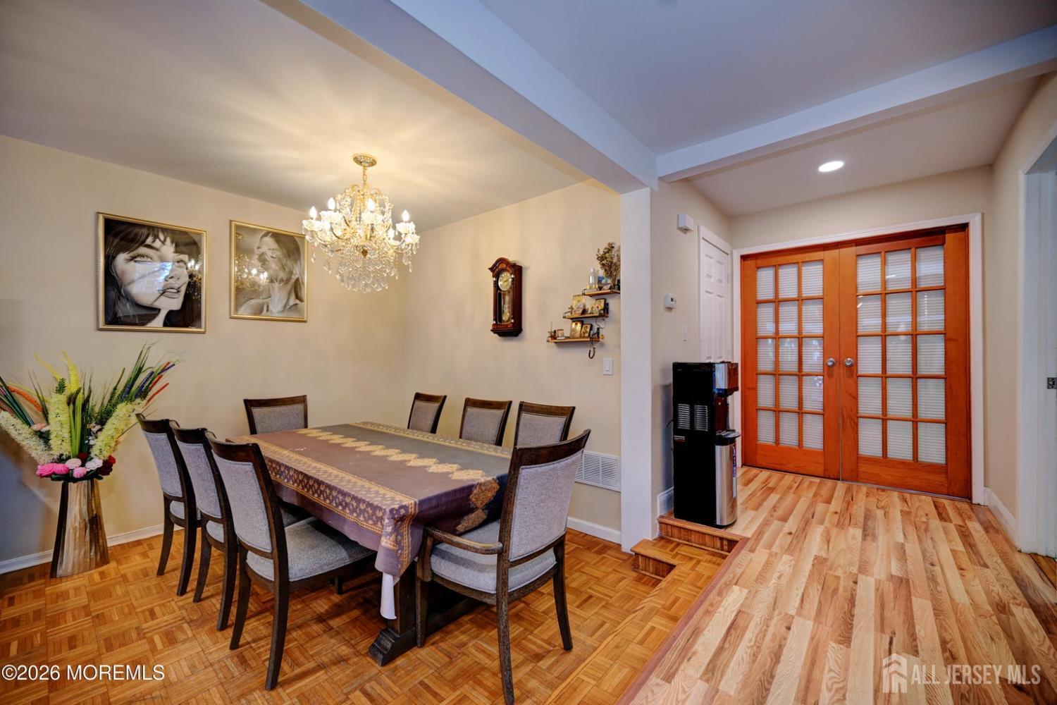 22 Borell Square Parlin, NJ 08859 - Photo 9 of 32 a view of a dining room with furniture and chandelier