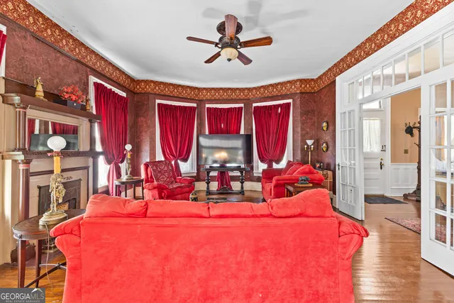 a large kitchen with stainless steel appliances granite countertop a sink and a stove