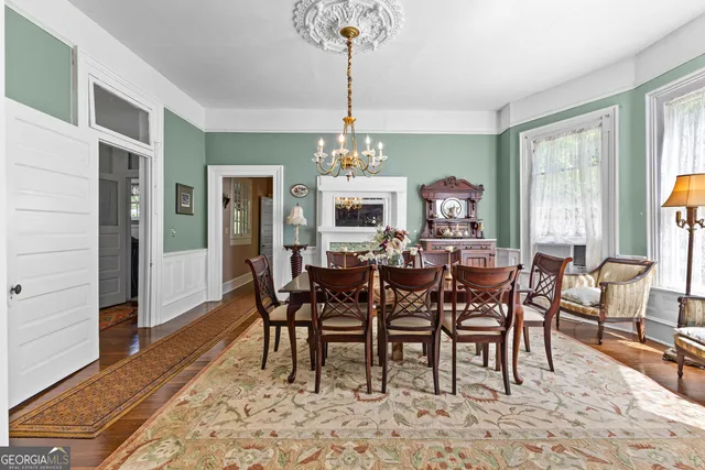 a bedroom with a bed and a fireplace