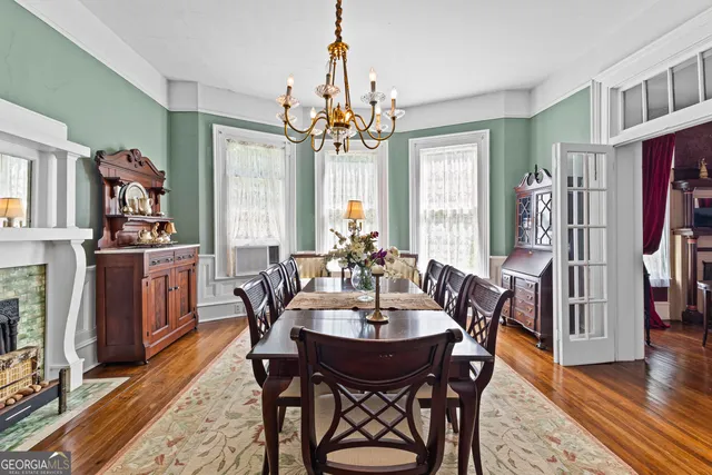 a bedroom with a bed and a desk