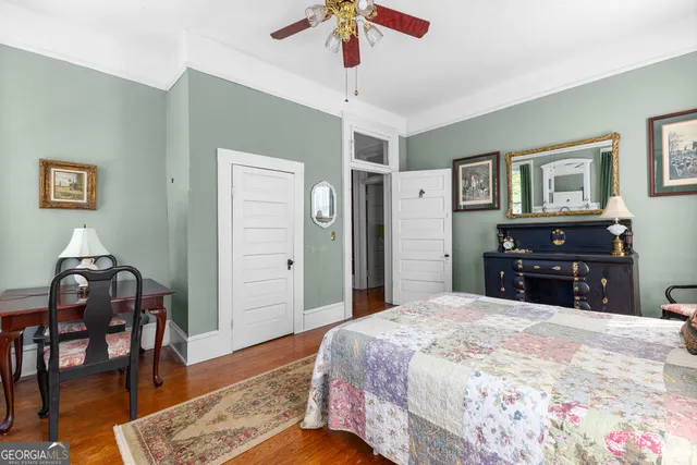 a view of a chair and table in the patio