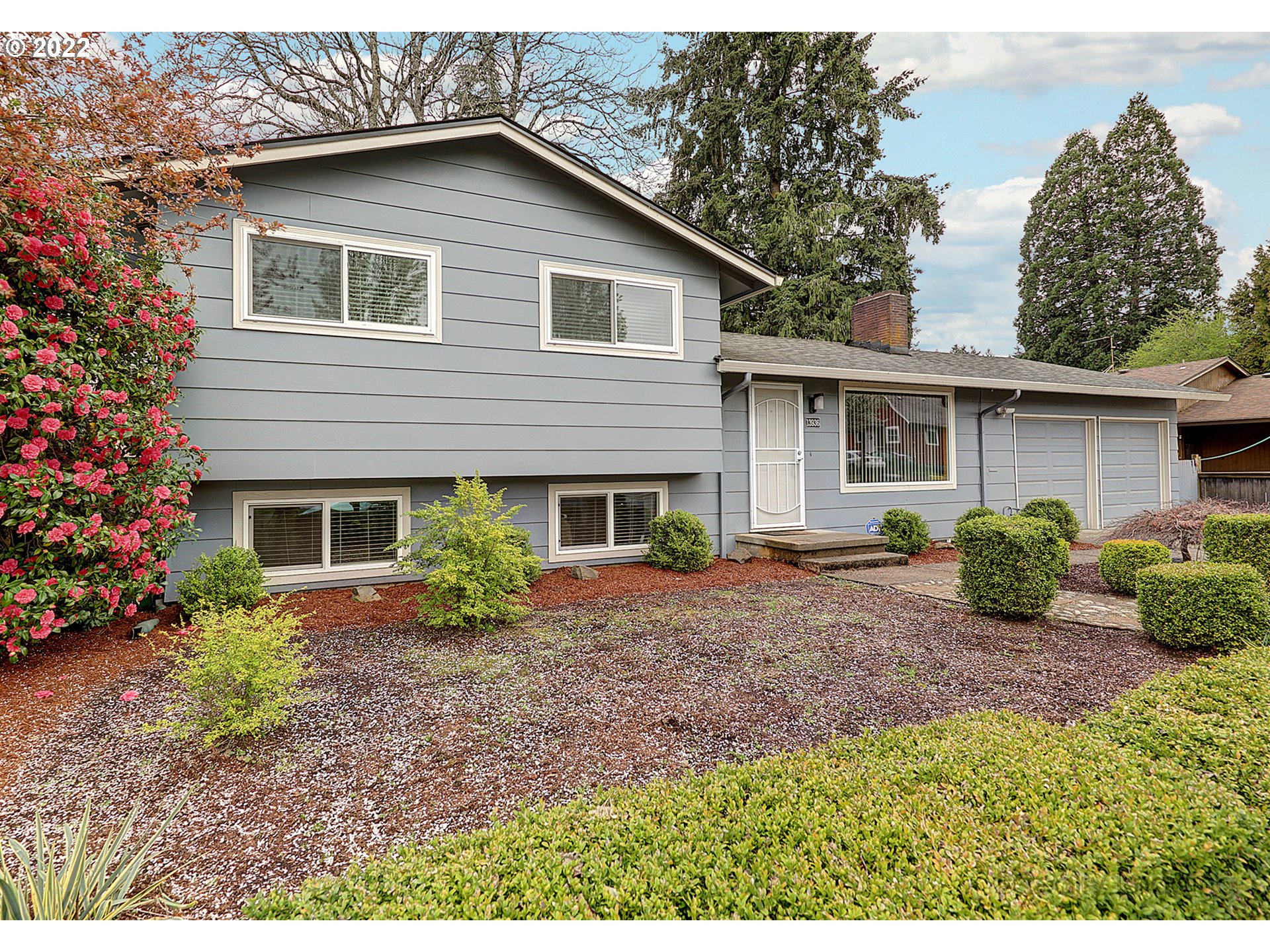 13936 Southeast Taylor Street Portland, OR 97233 - Photo 1 of 24 a view of a house with a garden