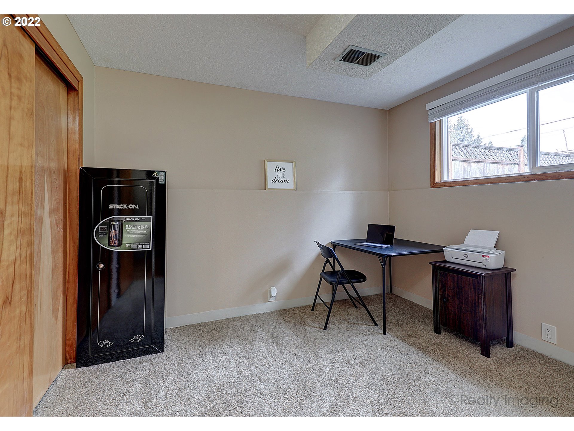 13936 Southeast Taylor Street Portland, OR 97233 - Photo 14 of 24 a room with furniture and a window