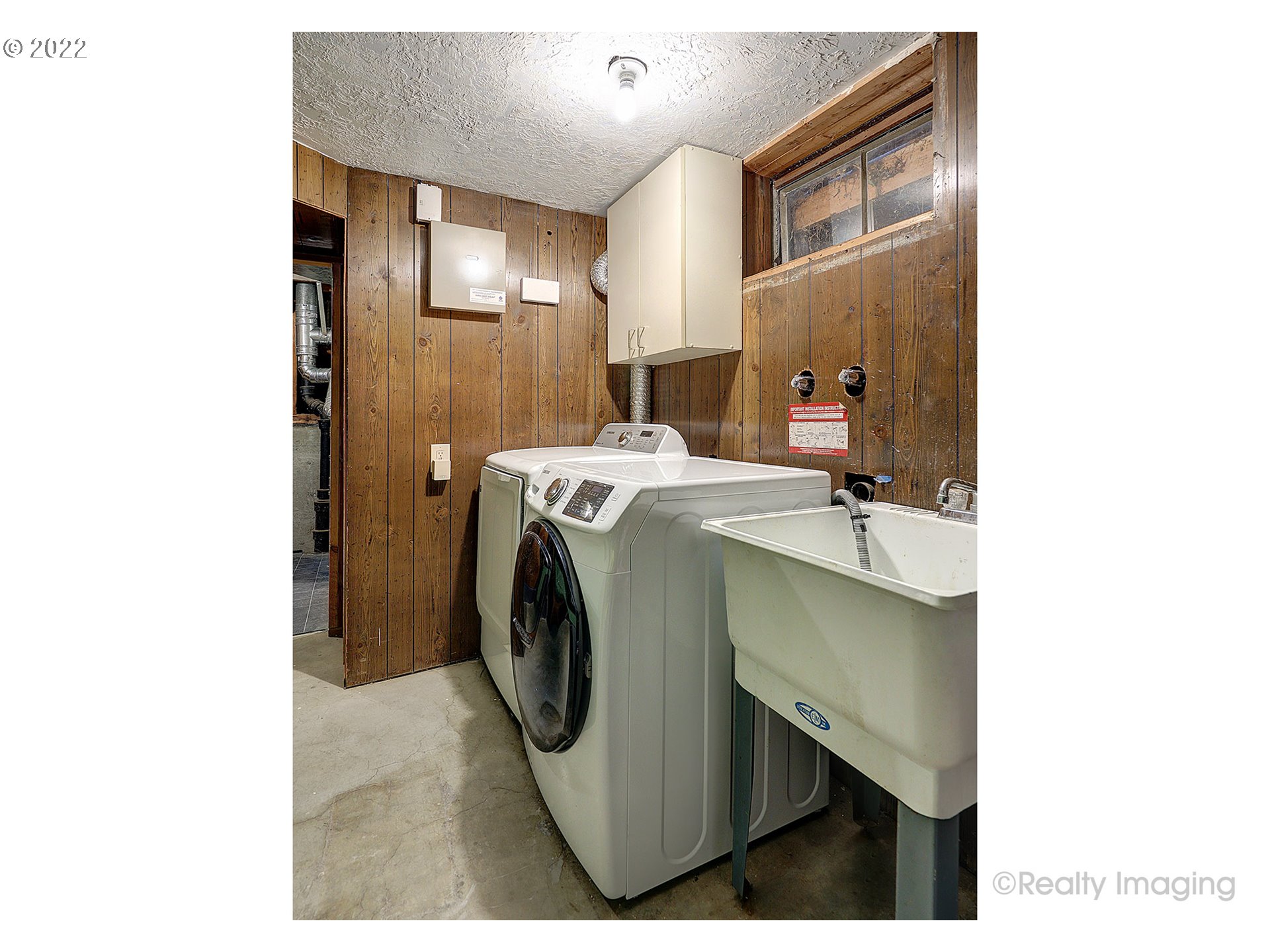 13936 Southeast Taylor Street Portland, OR 97233 - Photo 20 of 24 a utility room with dryer and washer