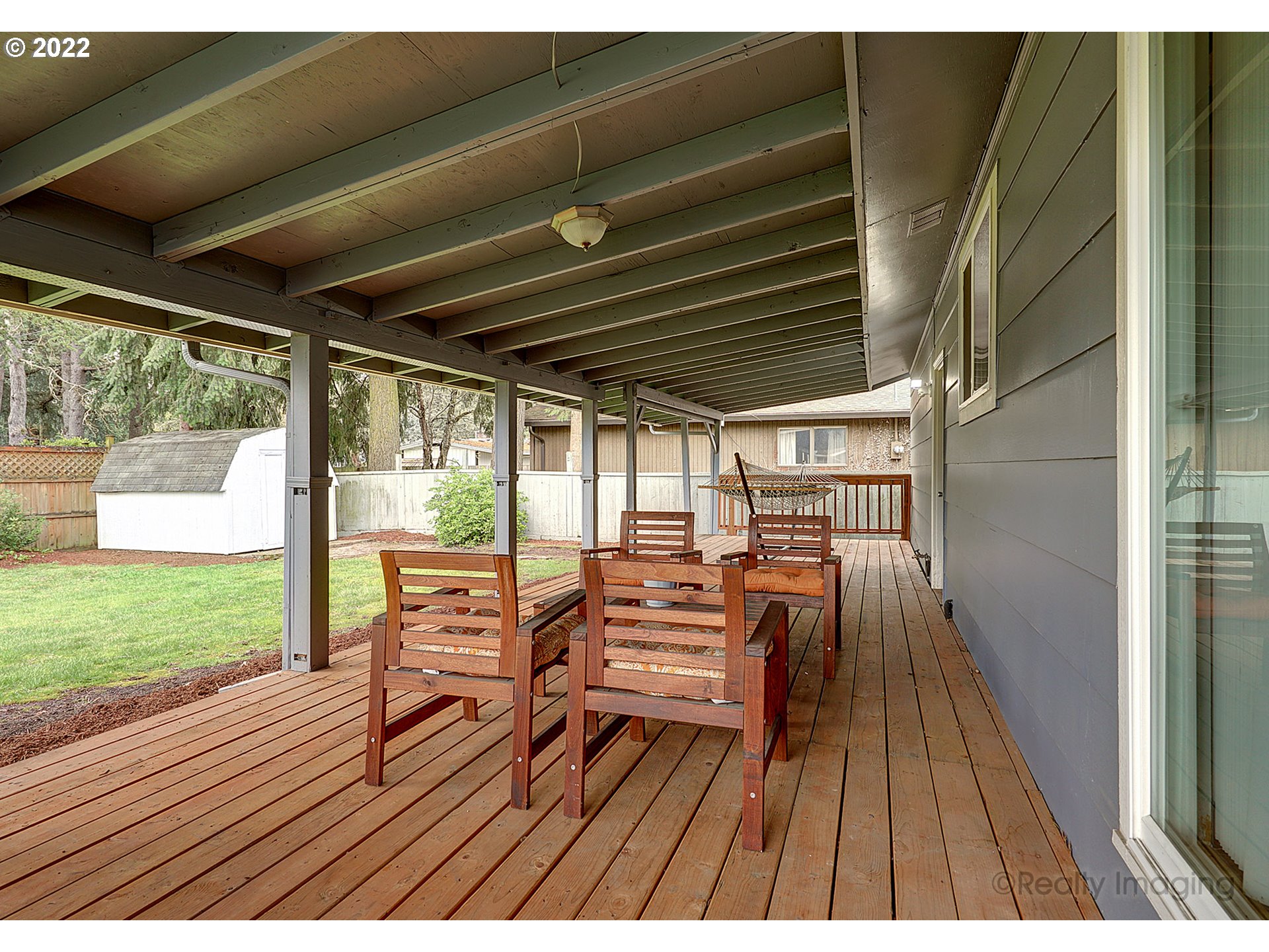 13936 Southeast Taylor Street Portland, OR 97233 - Photo 21 of 24 a view of balcony with wooden floor and outdoor seating