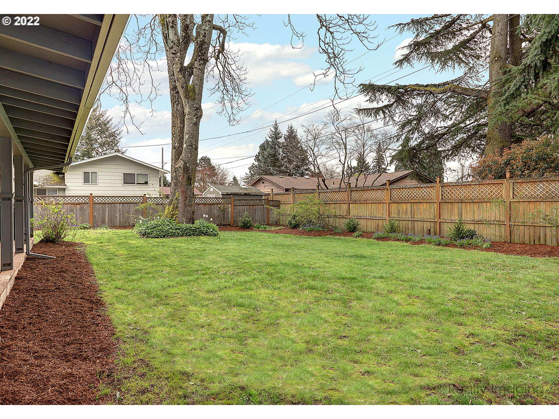13936 Southeast Taylor Street Portland, OR 97233 - Photo 22 of 24 a view of a backyard with a garden