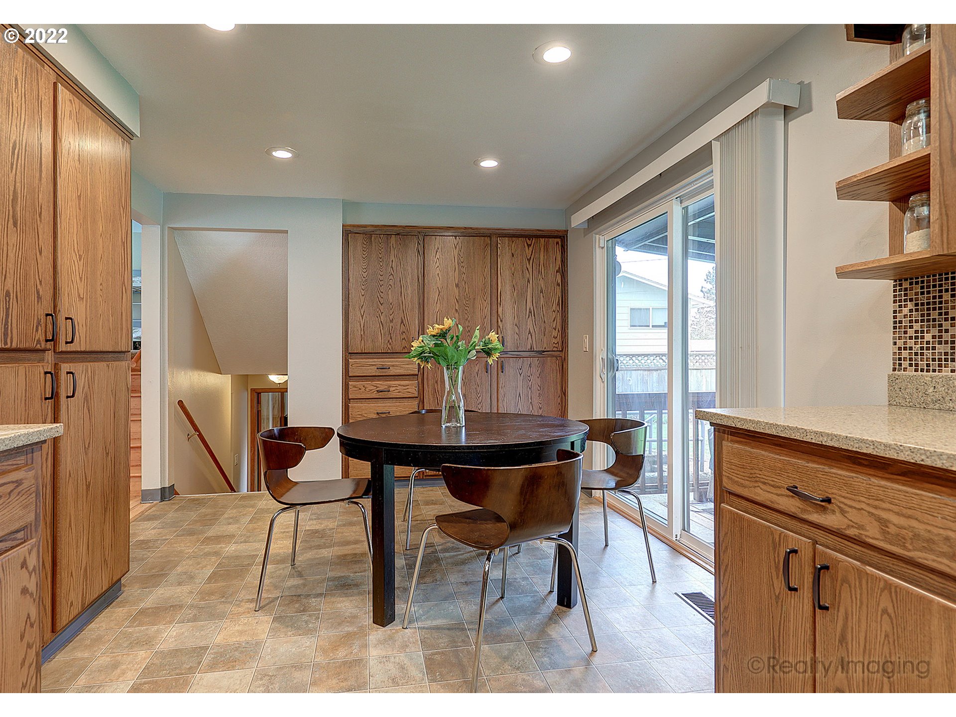 13936 Southeast Taylor Street Portland, OR 97233 - Photo 9 of 24 a view of a dining room with furniture and a window