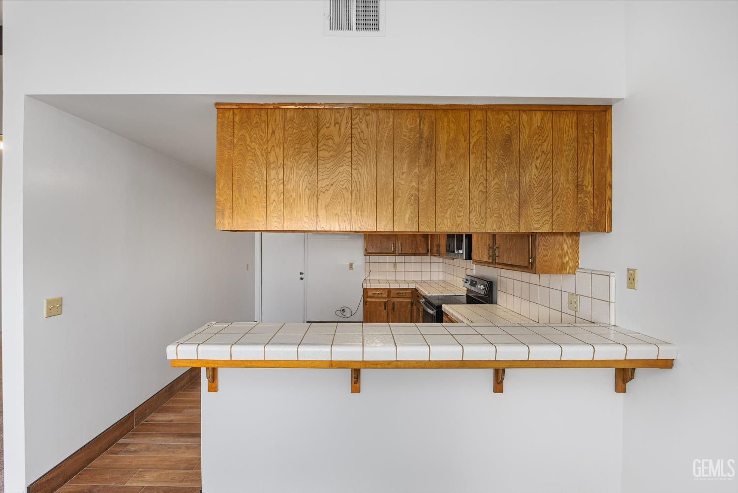 Undisclosed Address Bakersfield, CA 93308 - Photo 14 of 37 a kitchen with a sink and a window