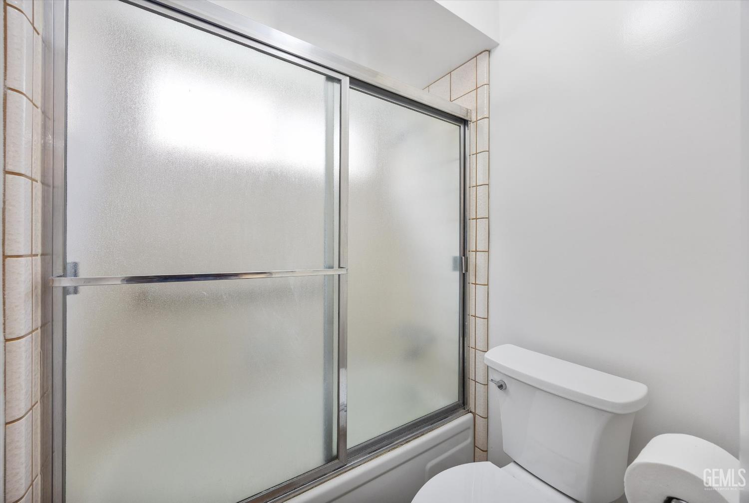 Undisclosed Address Bakersfield, CA 93308 - Photo 28 of 37 a bathroom with a shower and a toilet