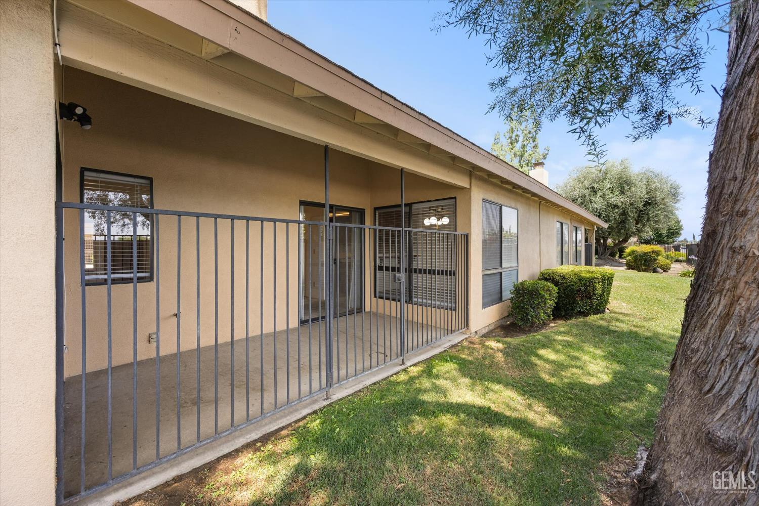 Undisclosed Address Bakersfield, CA 93308 - Photo 32 of 37 a view of a house with backyard and sitting area