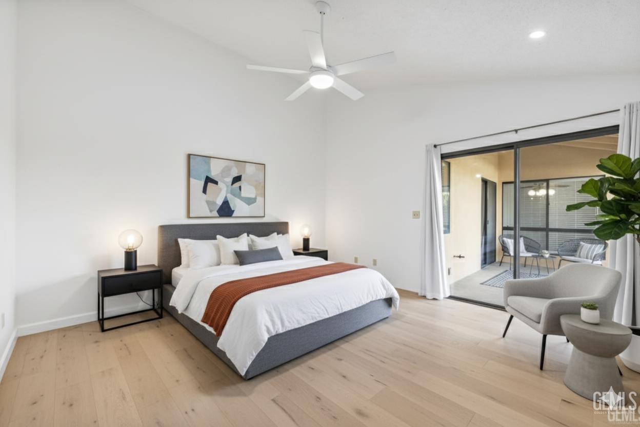 Undisclosed Address Bakersfield, CA 93308 - Photo 37 of 37 a bedroom with a bed and a chandelier