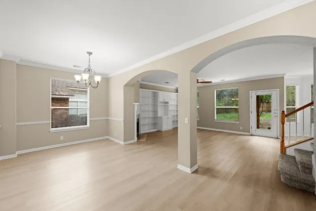 a view of livingroom with furniture wooden floor and window