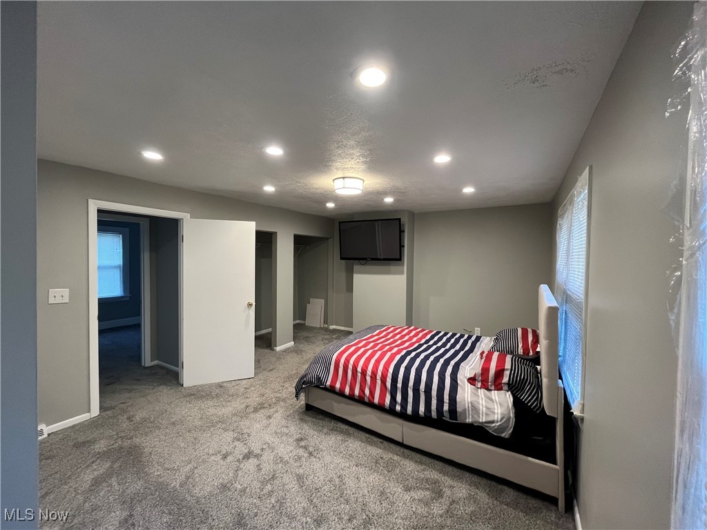1048 Pembrook Road Cleveland, OH 44121 - Photo 16 of 26 Bedroom with dark colored carpet