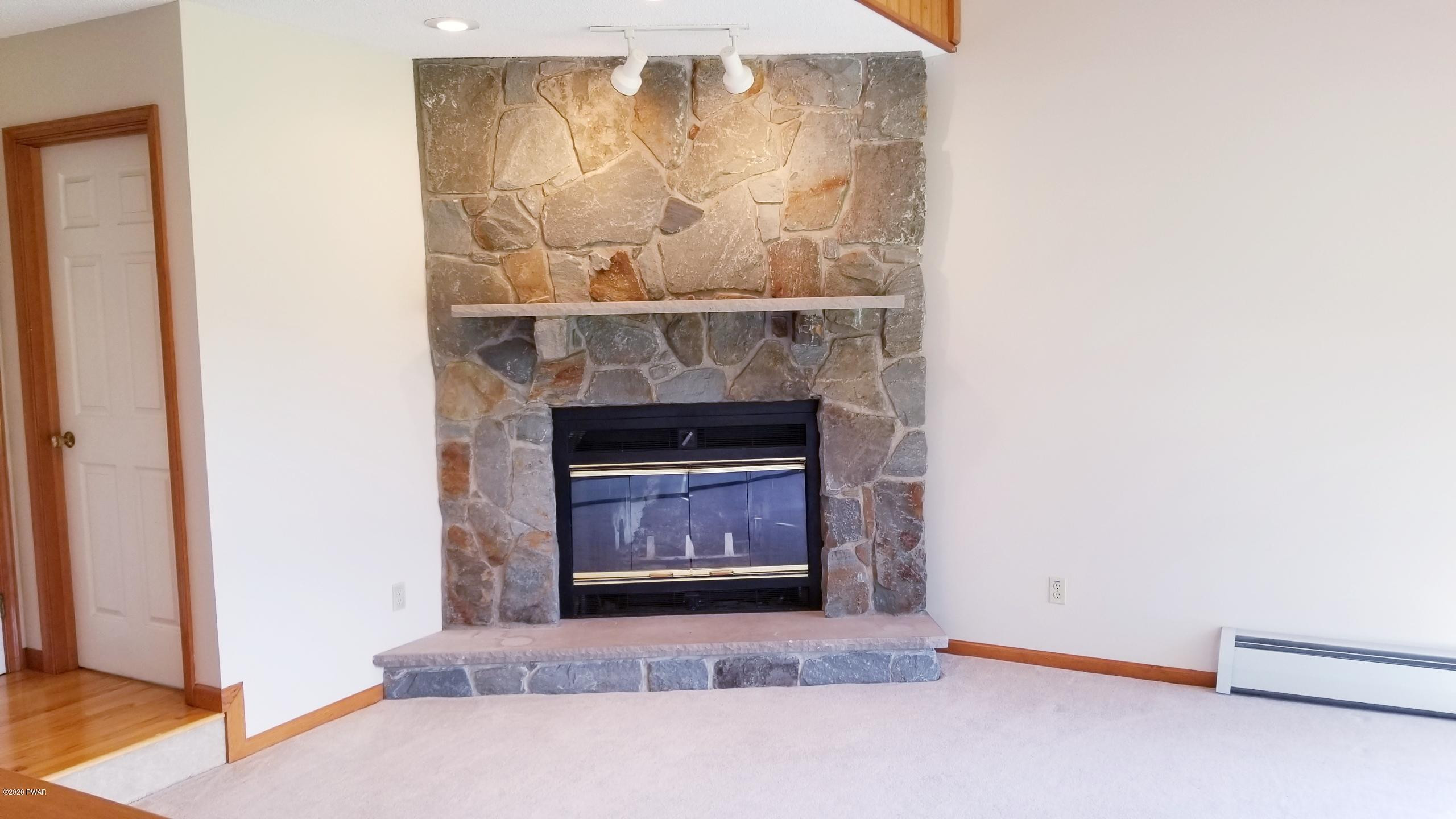 327 Wescott Road Tyler Hill, PA 18469 - Photo 14 of 37 Stunning stone fireplace