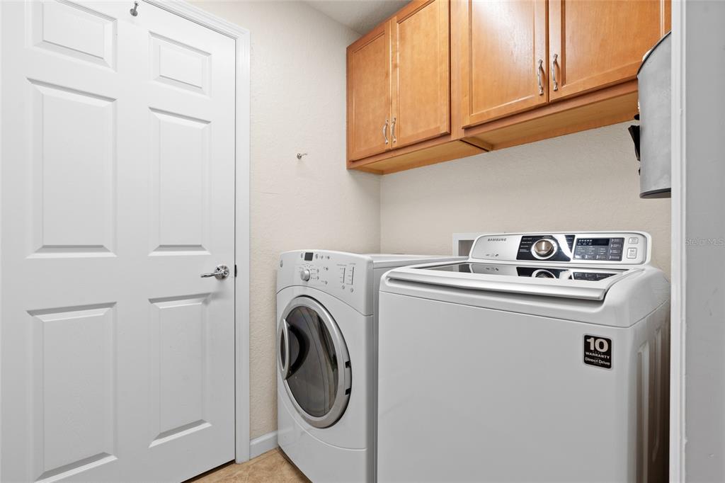 4683 Southwest 40th Place Ocala, FL 34474 - Photo 21 of 43 a utility room with dryer and washer