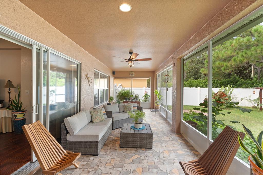 4683 Southwest 40th Place Ocala, FL 34474 - Photo 23 of 43 a living room with furniture and a large window