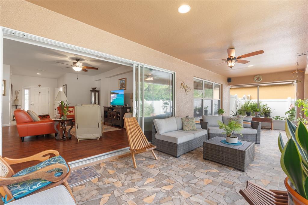4683 Southwest 40th Place Ocala, FL 34474 - Photo 24 of 43 a living room with furniture and a large window