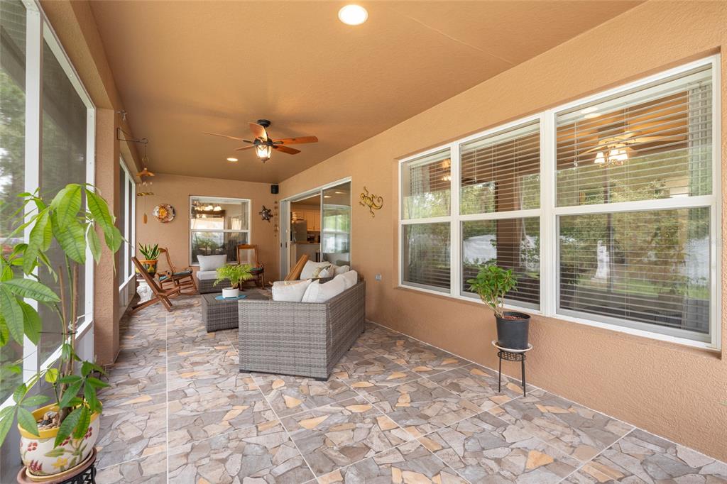 4683 Southwest 40th Place Ocala, FL 34474 - Photo 4 of 43 a living room with furniture and a window