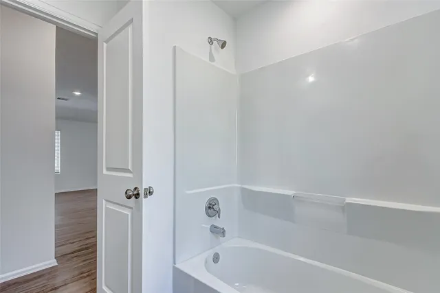 a bathroom with a bathtub