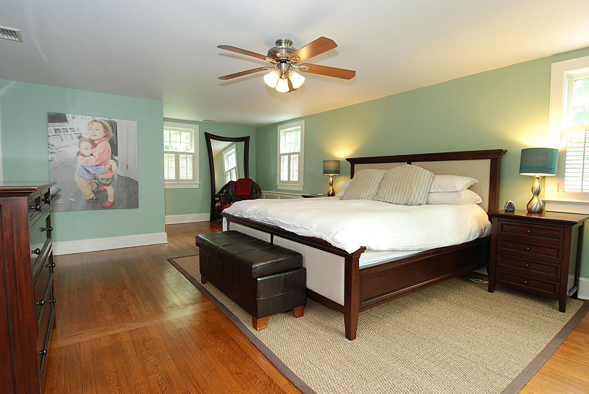 144 Marshall Ridge Road New Canaan, CT 06840 - Photo 8 of 24 a bedroom with a bed and window